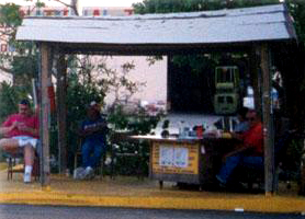 Guys Hanging out at Car Wash